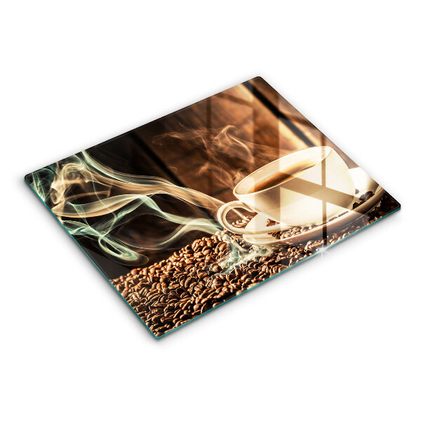Tocător din sticlă ceașcă și boabe de cafea
