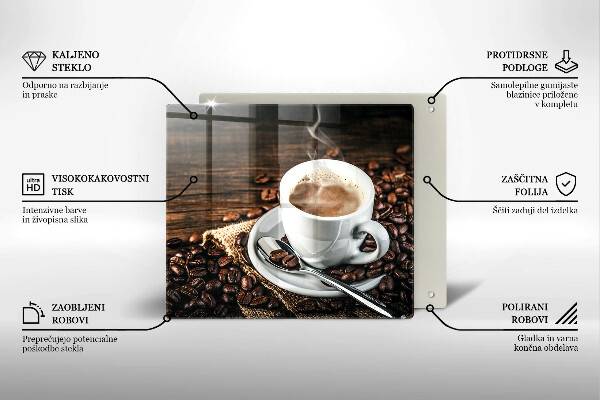 Tocător din sticlă ceașcă și boabe de cafea