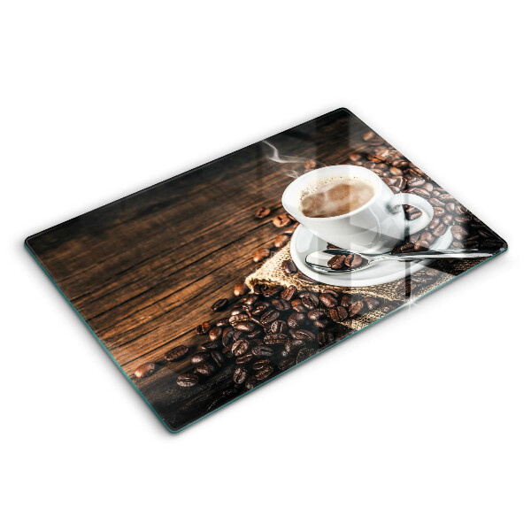 Tocător sticlă ceașcă și boabe de cafea
