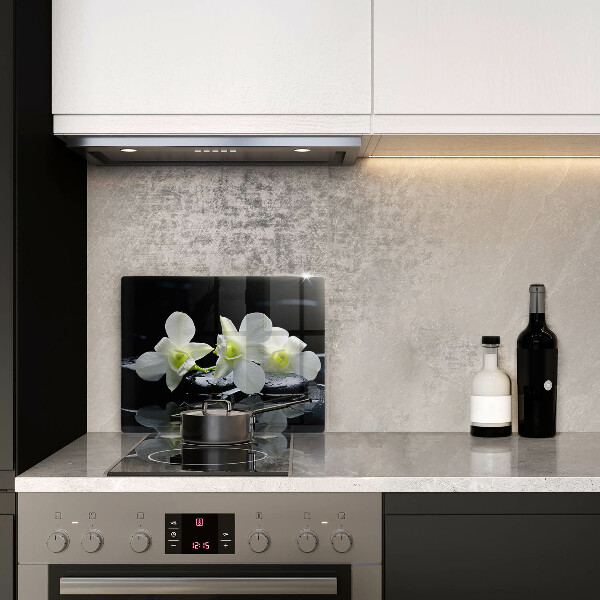 Placă sticla protectie aragaz Flori albe în apă zen