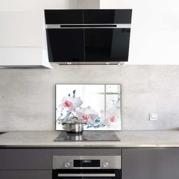 Panou sticlă bucătărie Orhideea stropită cu apă